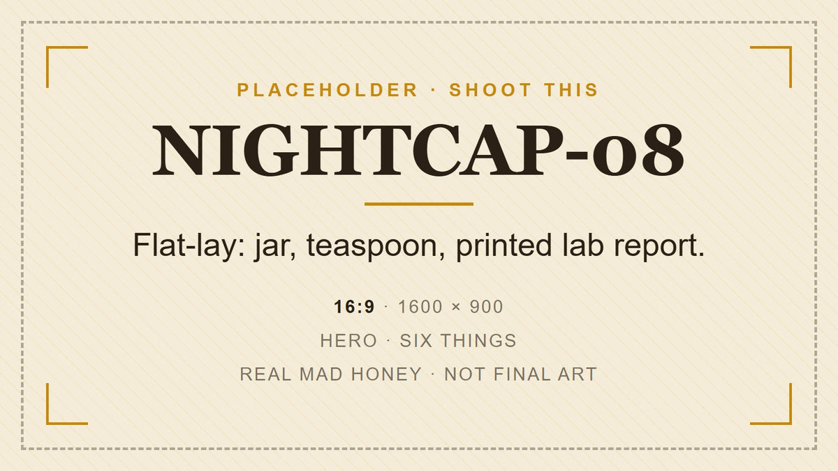 A jar of mad honey, a teaspoon and a printed lab report laid out on a table